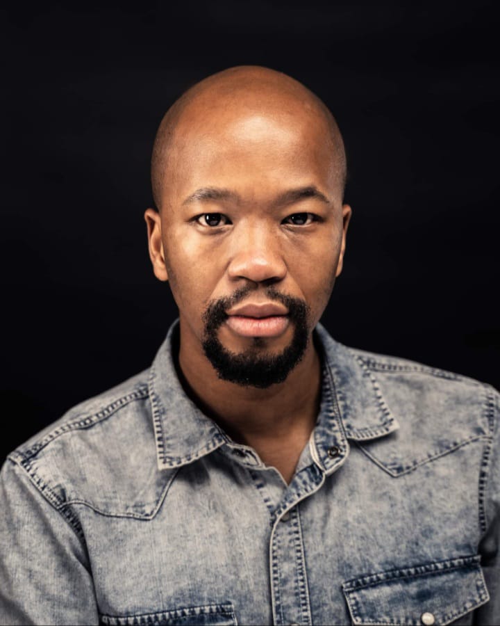 Muzi Mthembu Headshot Writer and Director of African America.jpg