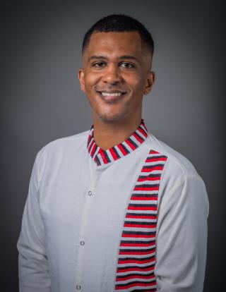 Headshot of Dr. Guluma; young man 